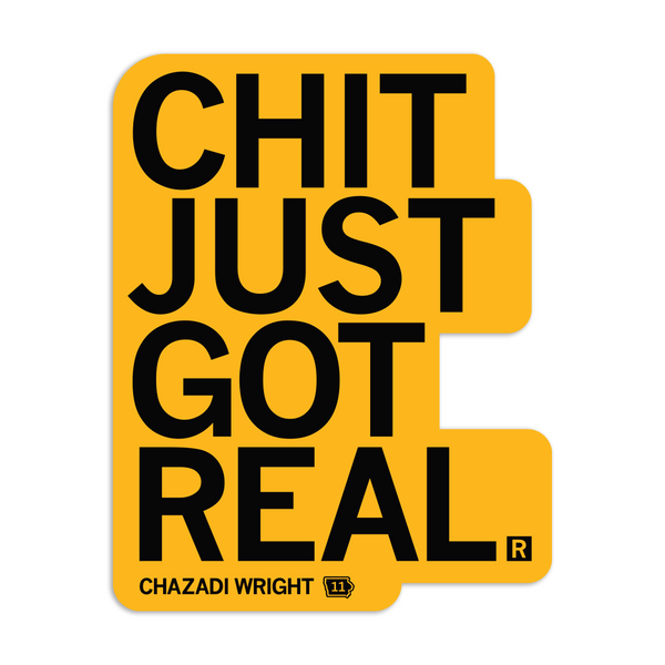 A gold die-cut sticker with black text that says, 