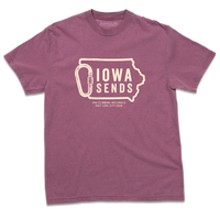 Heavyweight berry t-shirt with off white ink showing an outline of Iowa with it's western border being a carabiner. Large text inside the state outline says, "Iowa sends" and smaller text below reads "US Climbing Nationals. Salt Lake City 2026"