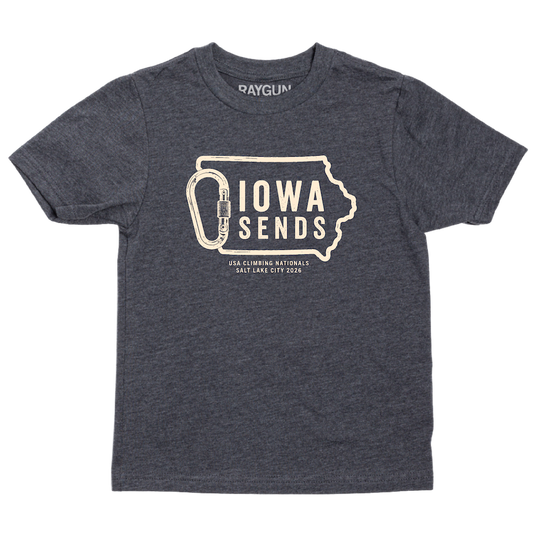 A youth sized charcoal t-shirt with off white ink showing an outline of Iowa with it's western border being a carabiner. Large text inside the state outline says, "Iowa sends" and smaller text below reads "US Climbing Nationals. Salt Lake City 2026"