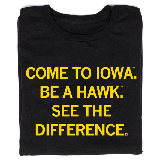 Black Iowa Hawkeye t-shirt with yellow text that reads, COME TO IOWA. BE A HAWK. SEE THE DIFFERENCE.