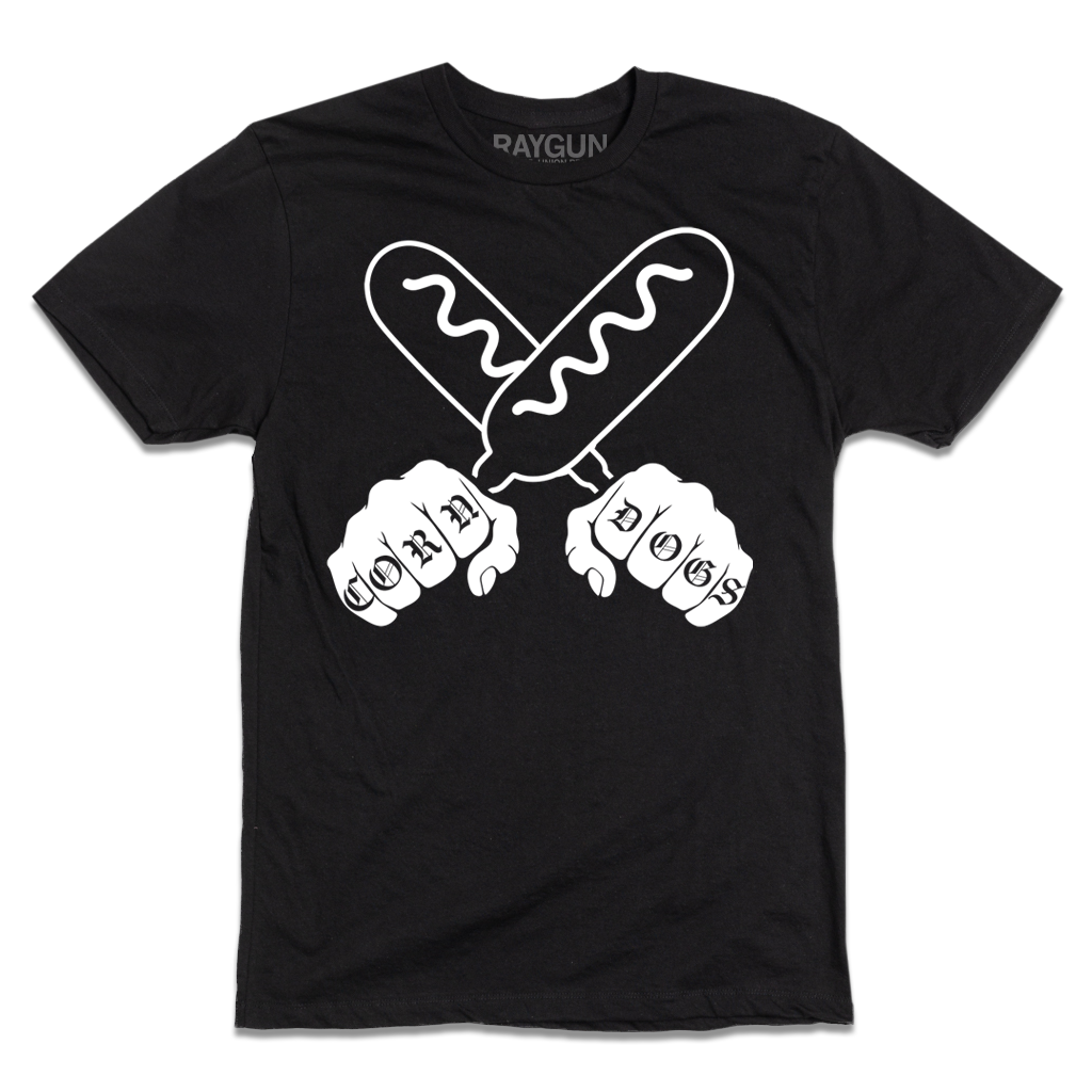 A short sleeve black t-shirt with a white print illustration of two hands holding corndogs in an X shape with knuckle tattoos that spell out "CORNDOGS."