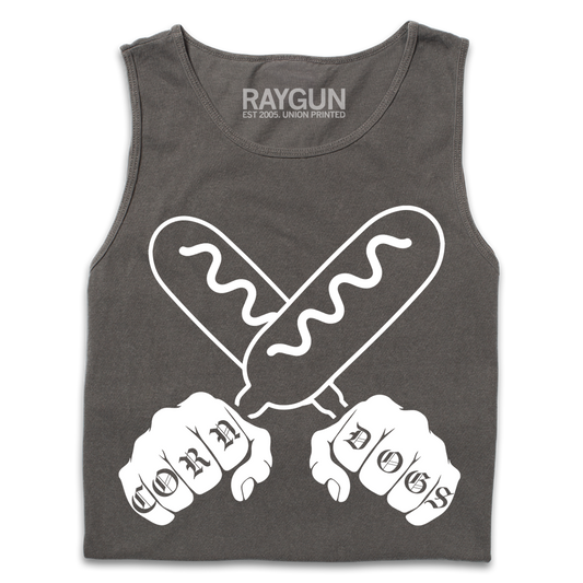 A folded grey tank top with a white print illustration of two hands holding corndogs in an X shape with knuckle tattoos that spell out "CORNDOGS."