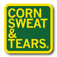 A square green sticker with rounded corners, a yellow border, and yellow text that says, "Corn Sweat & Tears"