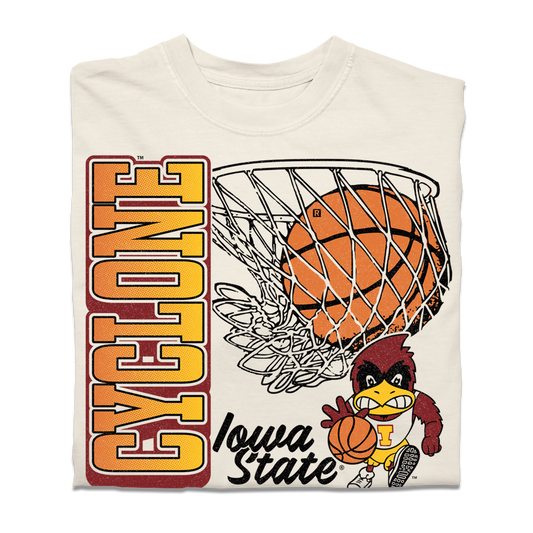 A cream heavyweight shirt with red, white, gold, black, and cardinal ink depicting a basketball going through a hoop above the vintage basketball Cy logo of Iowa State. Vertical text to the left reads "Cyclone" and down below horizontal text says, "Basketball. Established 1907."