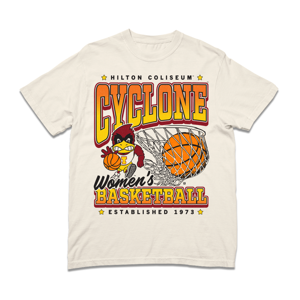 A off-white heavyweight shirt with black, red, orange, and gold ink. From top to bottom it reads "Hilton Coliseum. Cyclone Women's Basketball. Established 1973." With an illustration of Cy dribbling a basketball beside a giant basketball going through a hoop.