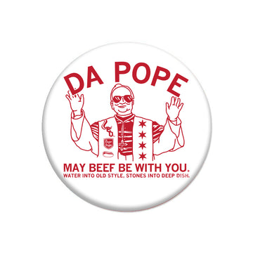 Circular RAYGUN button with a red graphic of a figure in vestments and sunglasses featuring the text DA POPE, MAY BEEF BE WITH YOU, and WATER INTO OLD STYLE, STONES INTO DEEP DISH.