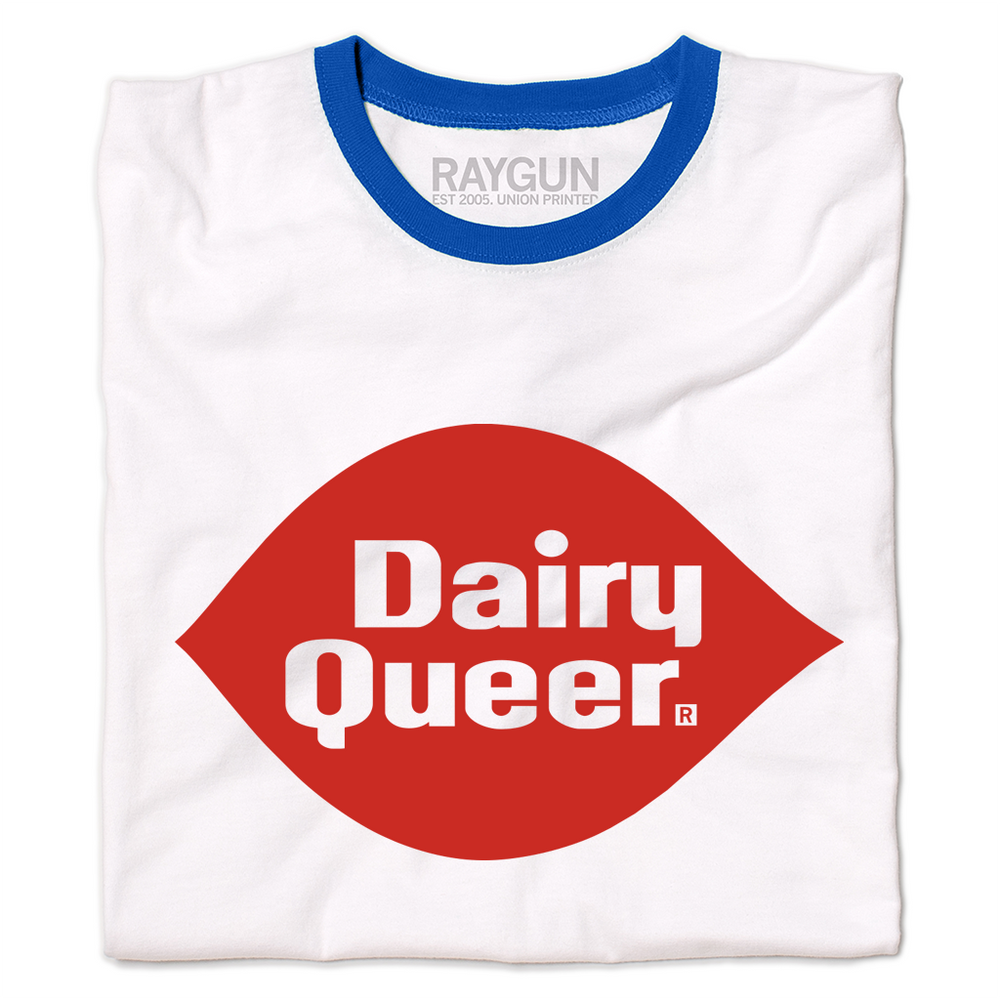 A folded white ringer shirt with a blue color and blue sleeve accents. In the center is red print spoofing the Dairy Queen logo that says, "Dairy Queer."