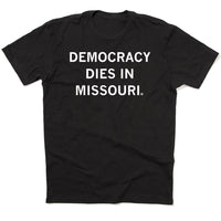 Laid out flat black shirt with white text that reads "Democracy Dies in Missouri"