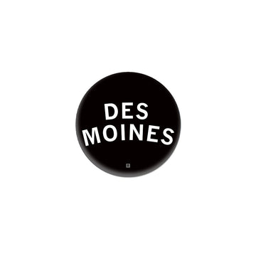 Black circular RAYGUN logo with the text DES MOINES in white capital letters.