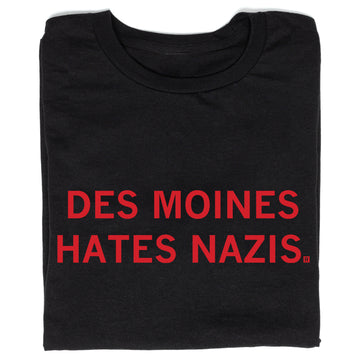 Union-made black t-shirt with the red text DES MOINES HATES NAZIS.