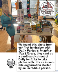 Promo image using an old photo inside a RAYGUN store with a cardboard cut-out of Dolly Parton next to a children's books display. At the bottom Gary is saying, "We found this photo from our first fundraiser with Dolly Parton's Imagination Library, they sent us a cardboard cut-out of Dolly for folks to take photos with. It's an incredible organization started by an incredible person.