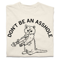 A folded off-white heavyweight t-shirt with curved black text that says, "DON'T BE AN ASSHOLE" above an illustration of a cat holding a raygun.