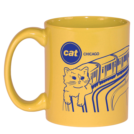 Yellow RAYGUN mug featuring a blue line-art CAT El cat train illustration, with the text cat inside a blue circle and the word CHICAGO next to it.
