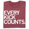 Maroon RAYGUN t-shirt with the white text EVERY KICK COUNTS.