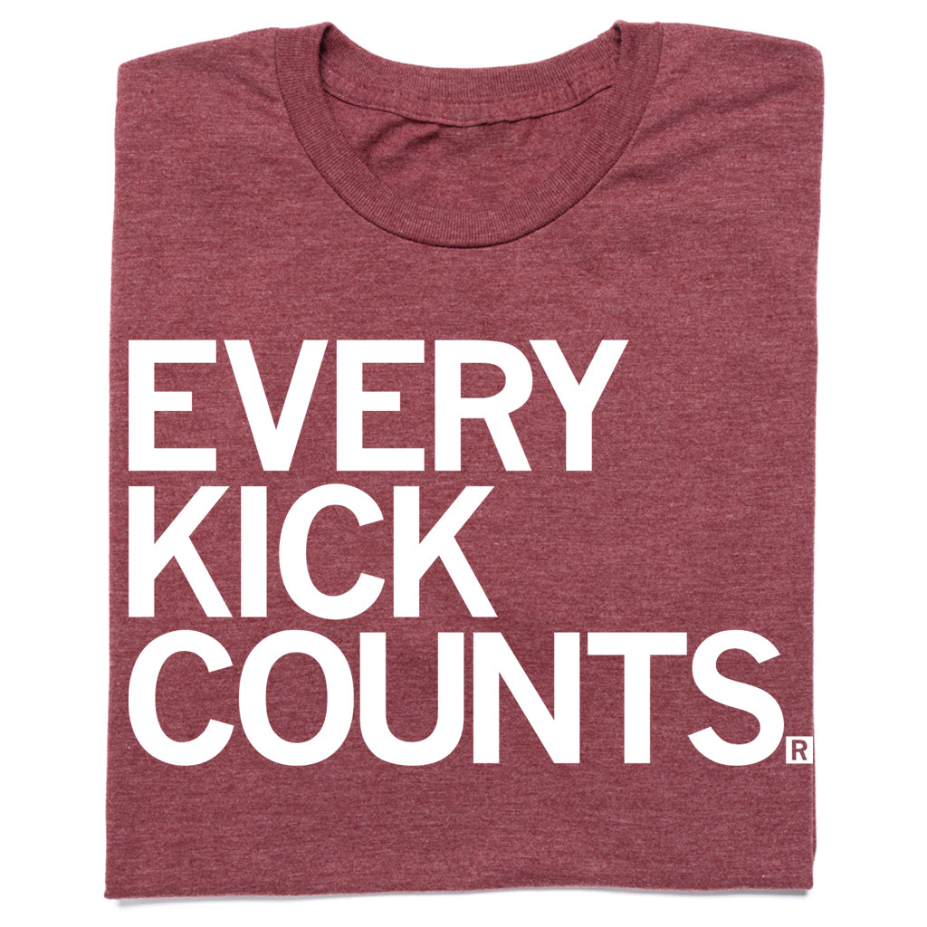 Maroon RAYGUN t-shirt with the white text EVERY KICK COUNTS.