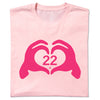 Neon pink RAYGUN T-shirt featuring a dark pink graphic of hands forming a heart shape around the number 22.