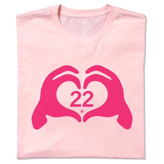 Neon pink RAYGUN T-shirt featuring a dark pink graphic of hands forming a heart shape around the number 22.