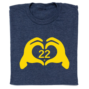 Navy blue RAYGUN t-shirt with a yellow graphic of two hands forming a heart shape around the number 22.