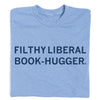 Light blue RAYGUN t-shirt featuring the text FILTHY LIBERAL BOOK-HUGGER printed in dark blue.