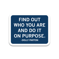 A rectangular blue sticker with rounded edges, a white border, and white text that says, "Find out who you are and do it on purpose." - Dolly Parton"