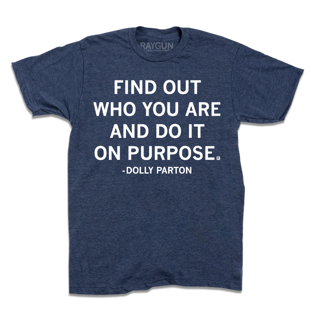 Short sleeve heather denim t-shirt with white print that reads ""Find out who you are and do it on purpose." - Dolly Parton"