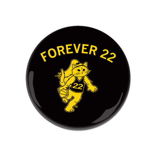 RAYGUN metal button featuring a yellow graphic of a cat wearing a basketball jersey with the number 22, dribbling a basketball, with the text FOREVER 22 arched above.