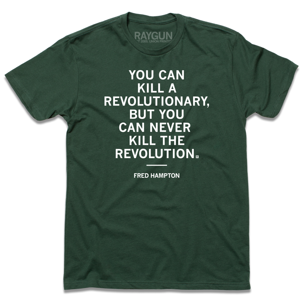 Forest green T-shirt with the white text You can kill a revolutionary, but you can never kill the revolution and the name Fred Hampton printed on the chest.