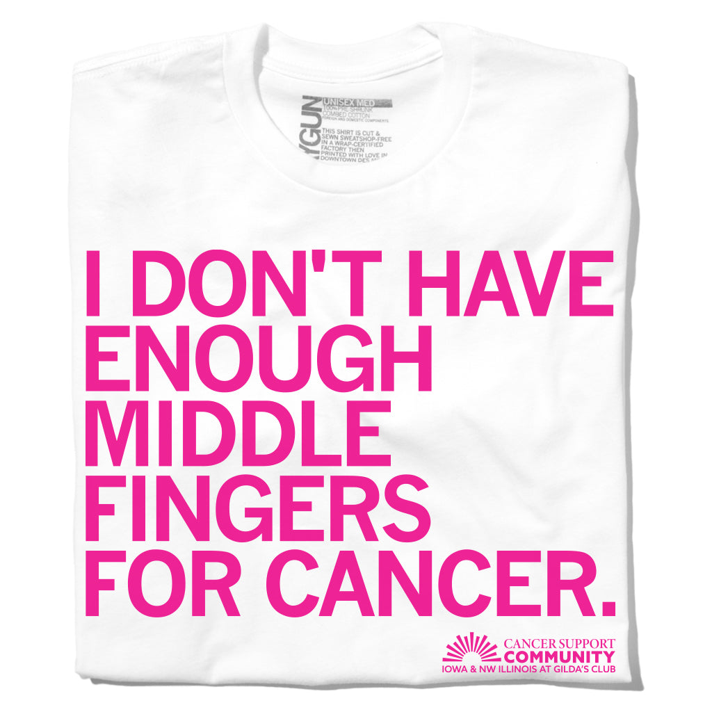 White Gilda’s Club t-shirt featuring the rhodamine red text I DONT HAVE ENOUGH MIDDLE FINGERS FOR CANCER and a Cancer Support Community logo at the bottom.