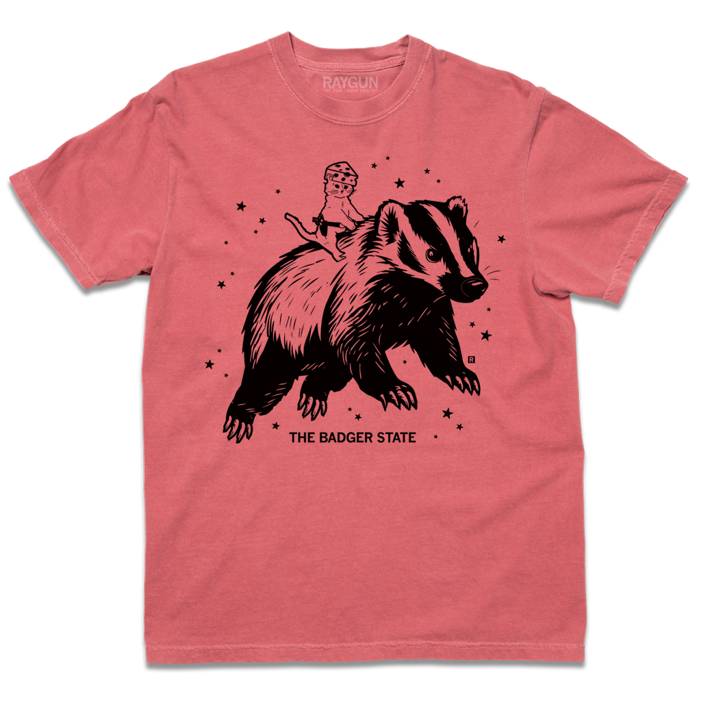 Crimson Comfort Colors heavyweight t-shirt with a black ink graphic of a cat wearing a cheese hat riding a giant badger above the text "The Badger State"