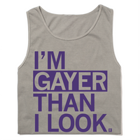 A folded heavyweight grey tank top with purple ink print that reads "I'm gayer than I look."