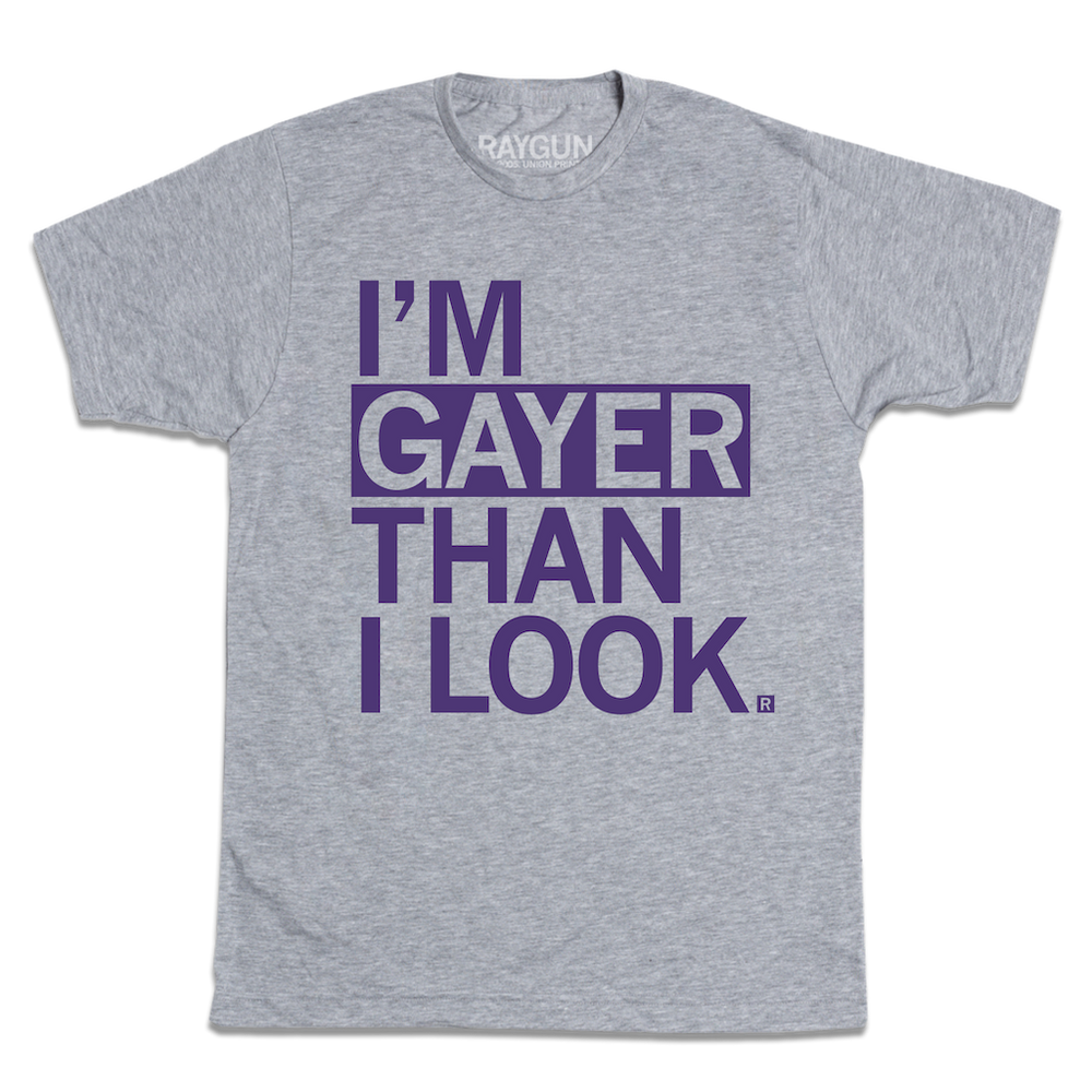 Short sleeve heather grey t-shirt with purple ink text that says, "I'm gayer than I look."