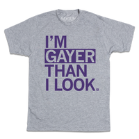 Short sleeve heather grey t-shirt with purple ink text that says, "I'm gayer than I look."