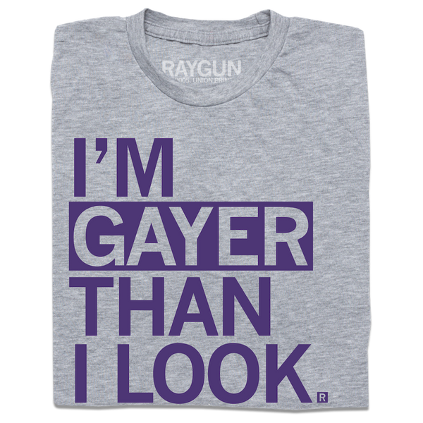 A heather grey t-shirt with left aligned purple ink that reads 