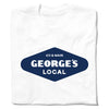 White crew neck union-made t-shirt featuring a blue diamond-shaped graphic that reads 4th & Main GEORGES LOCAL from Cedar Falls, Iowa.