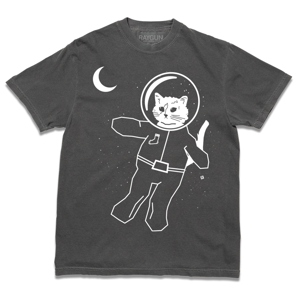 A pepper heavyweight t-shirt with glow in the dark ink depicting RAYGUN's cat mascot, Gary, as an astronaut with tiny stars and the moon behind him.