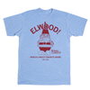 Light blue RAYGUN T-shirt featuring a maroon graphic of a concrete gnome, the text ELWOOD!, and REIMAN GARDENS, WORLDS LARGEST CONCRETE GNOME!, AMES, IOWA.