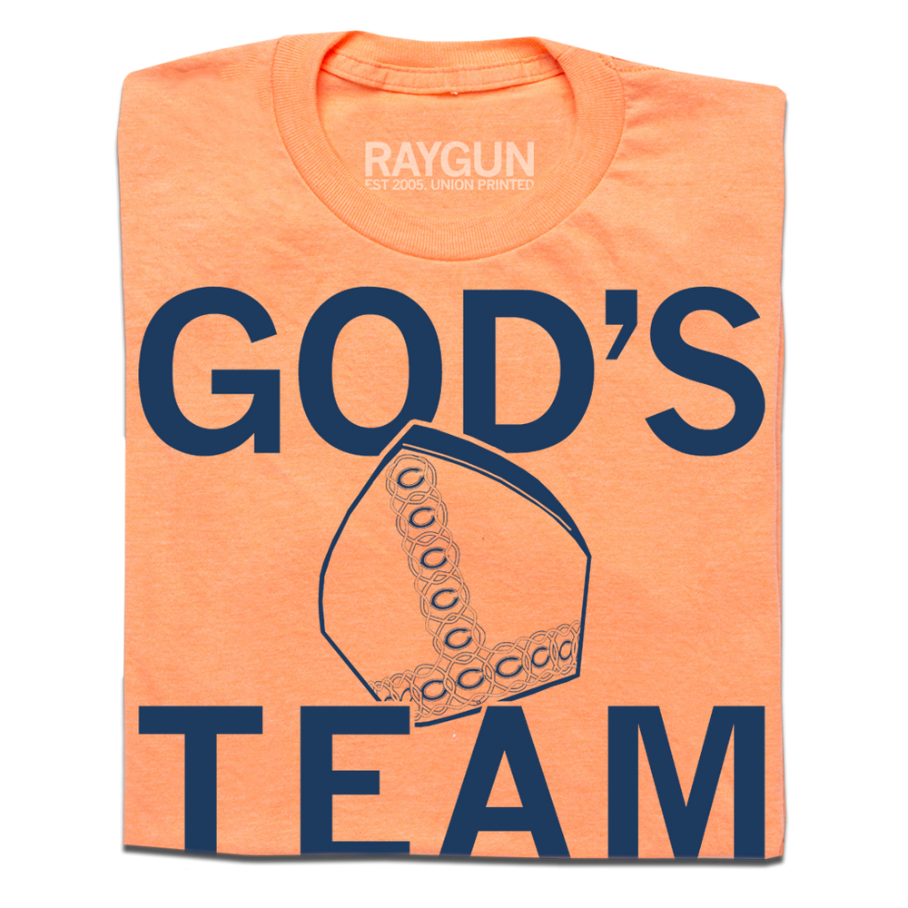 Heather orange shirt with navy ink that says, "God's Team" over an illustration of the pope's mitre.