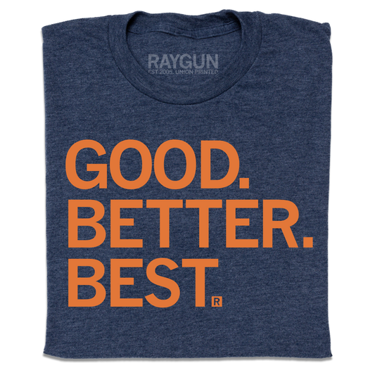 Folded heather navy t-shirt with orange ink that reads "Good. Better. Best."