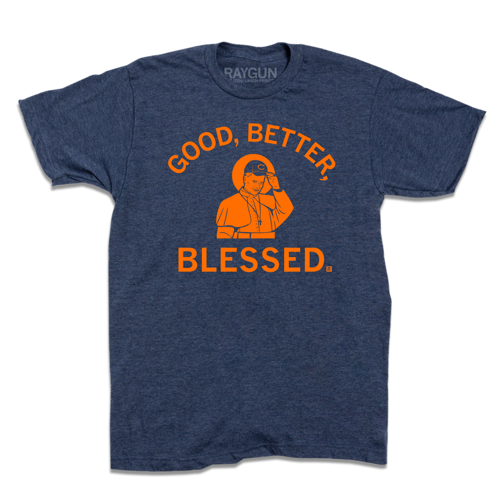 Short-sleeve heather navy t-shirt with orange ink. An illustration of Pope Leo wearing a hat with a C on it is in the center. Text above and below combines to read "GOOD, BETTER, BLESSED."