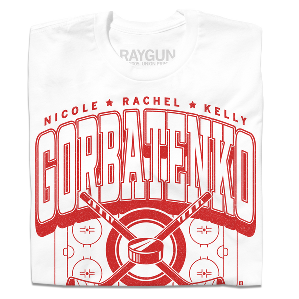 A folded white t-shirt with bright red text that reads, 