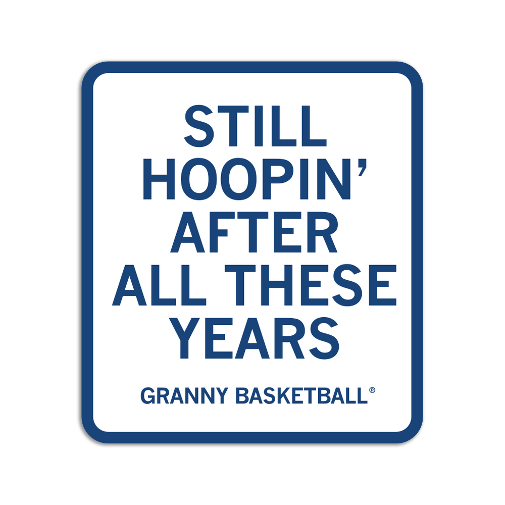 A square white sticker with a rounded blue border and blue text that says, "STILL HOOPIN' AFTER ALL THESE YEARS. GRANNY BASKETBALL" in all caps.