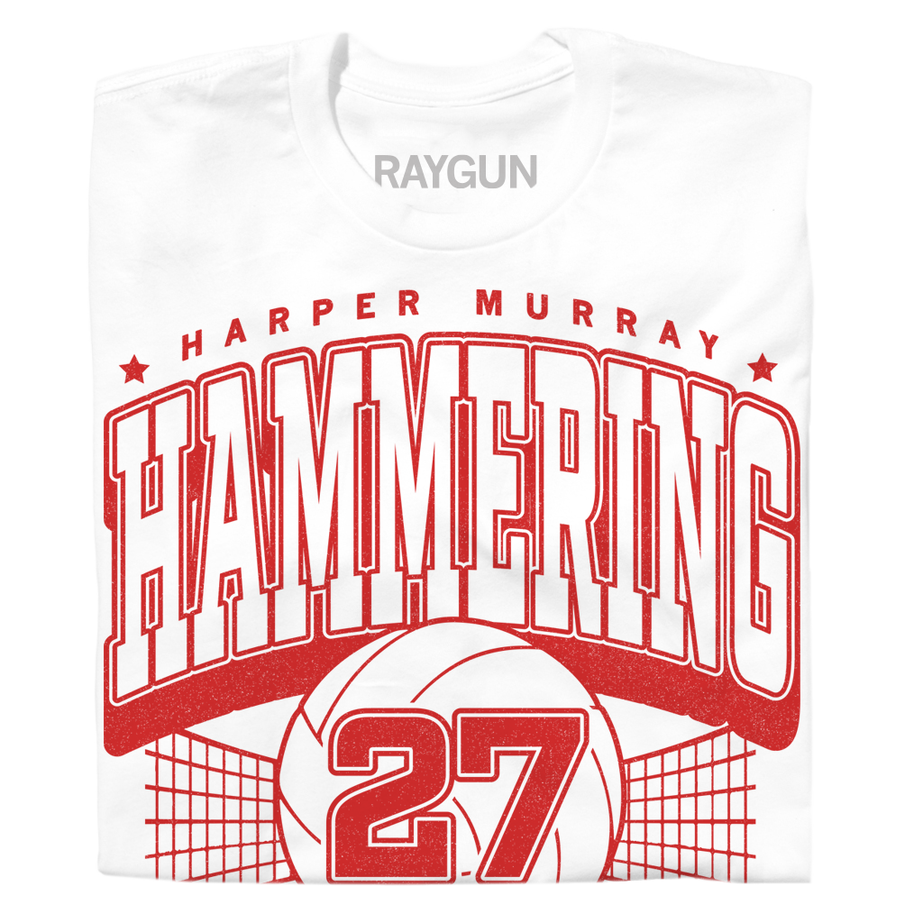 White, officially licensed Harper Murray t-shirt with a red graphic featuring the text HARPER MURRAY HAMMERING 27, a volleyball, and a net.