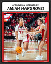 Nebraska basketball player Amiah Hargrove, wearing her officially licensed number 33 jersey, dribbles the ball while being guarded by an opponent during a game.