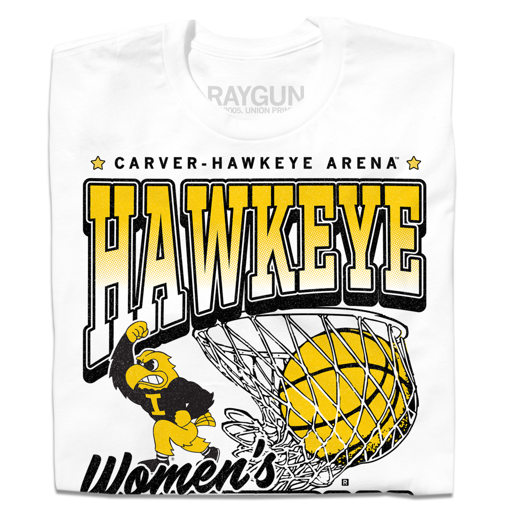 A folded white t-shirt with Gold & Black ink. From top to bottom it reads "Carver-Hawkeye Arena. Hawkeye Women's Basketball. Established 1974." Herky the Hawk and a basketball in the net are in the center of the shirt.