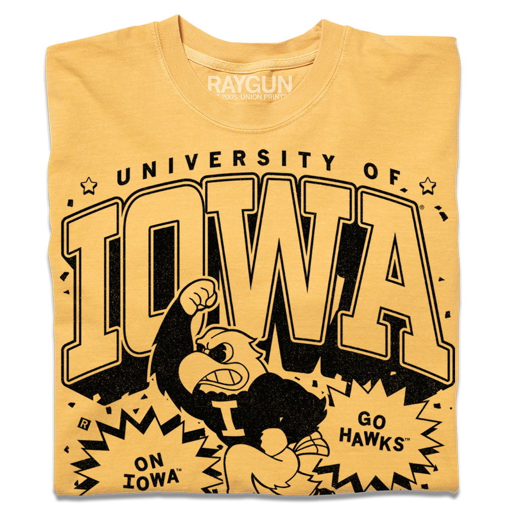 Officially licensed yellow Iowa T-shirt with University of Iowa and Go Hawks printed in black, featuring a graphic of the Iowa Hawkeye mascot raising a fist.