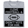 Heather grey t-shirt featuring a football graphic and the text I LOVE FOOTBALL & DIDNT VOTE FOR HIM.