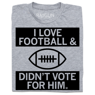 Heather grey t-shirt featuring a football graphic and the text I LOVE FOOTBALL & DIDNT VOTE FOR HIM.