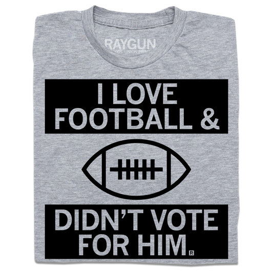 Heather grey t-shirt featuring a football graphic and the text I LOVE FOOTBALL & DIDNT VOTE FOR HIM.