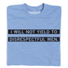 Light blue union-made AOC t-shirt featuring the text I WILL NOT YIELD TO DISRESPECTFUL MEN printed in two black bars.