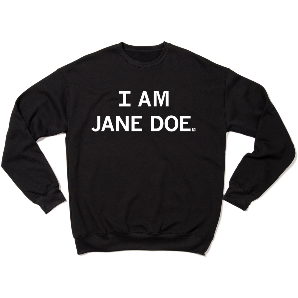Black crewneck sweatshirt with all caps white text that says, "I AM JANE DOE."